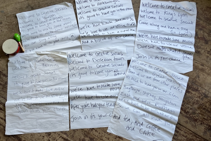 Large pieces of paper laid out on the floor